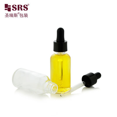 comprar Sero facial Botella de aceite esencial de vidrio clara con gotero Fabricación en línea